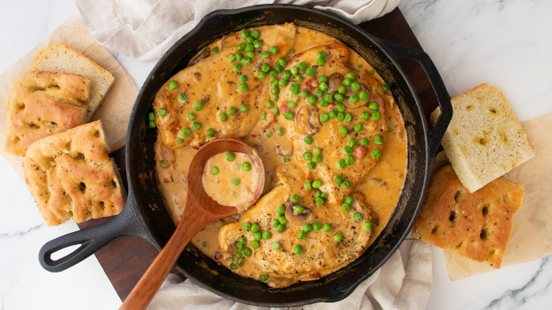 Overhead shot of chicken a la king in a large skillet