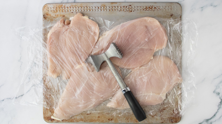 Chicken breasts pounded into thin cutlets with a meat mallet.