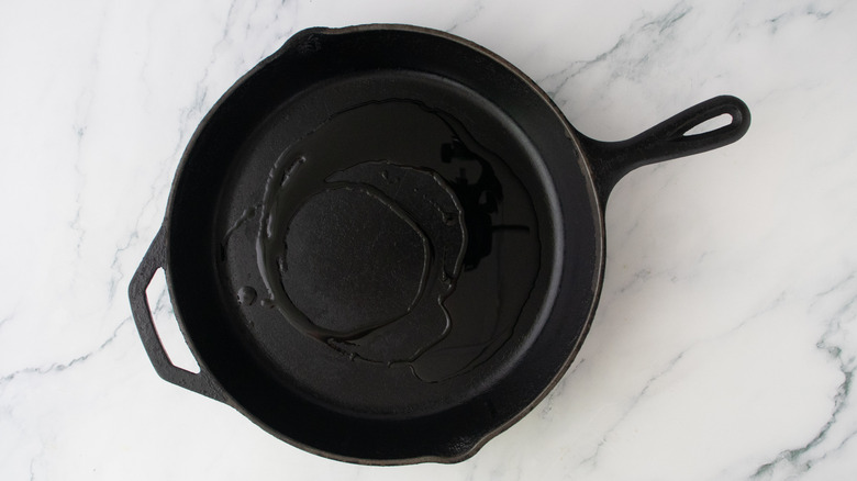 Large skillet drizzled with olive oil