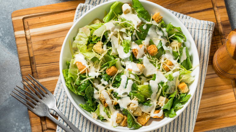 Homemade Caesar salad with cheese dressing.