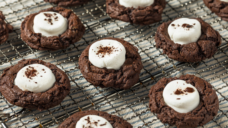 Hot cocoa cookies on a cooling rack