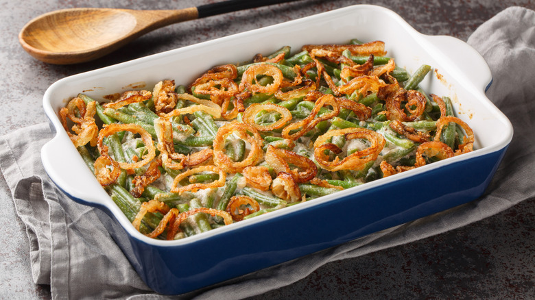 Green bean casserole with a spoon next to the dish