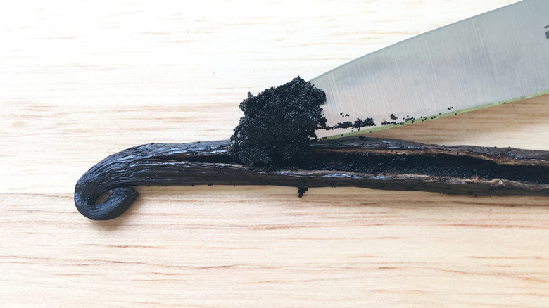 Scraping vanilla seeds from pod