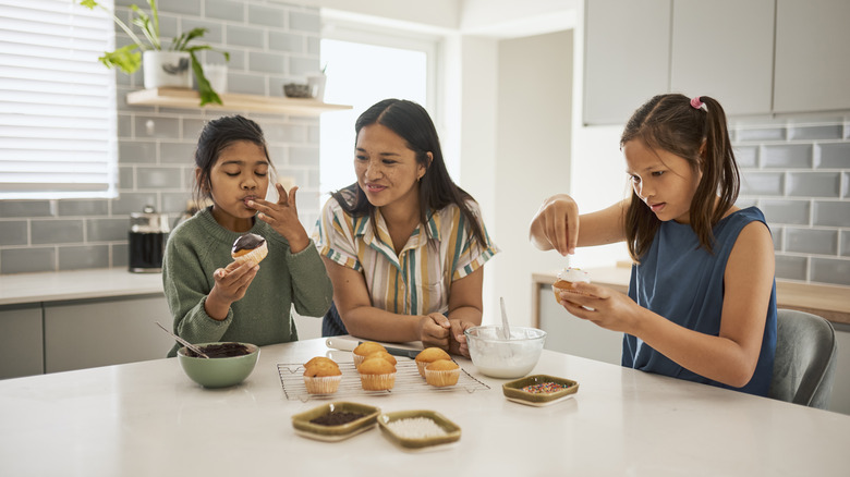 family baking in kitche