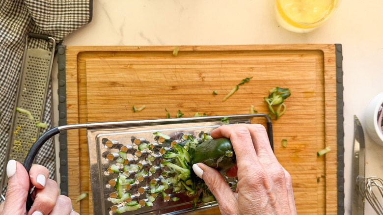 hand grating cucumber