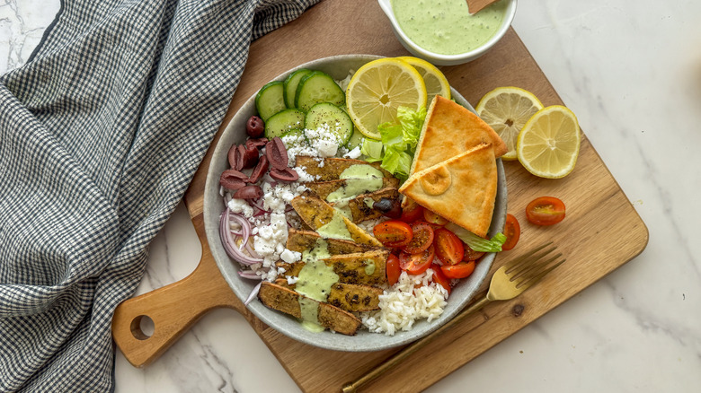 bowl with dressing on board