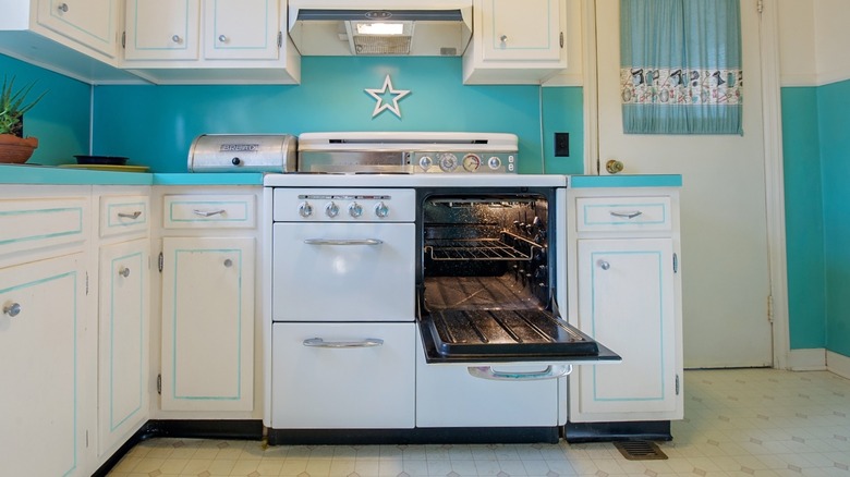 A 1950s oven with multiple doors.