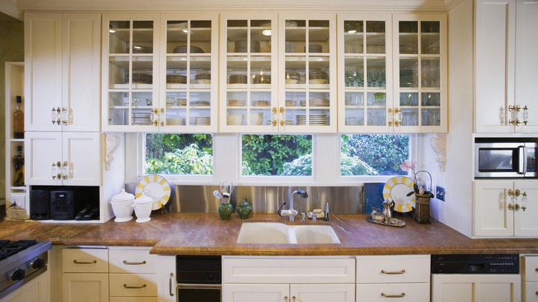 Glass cabinet doors in kitchen