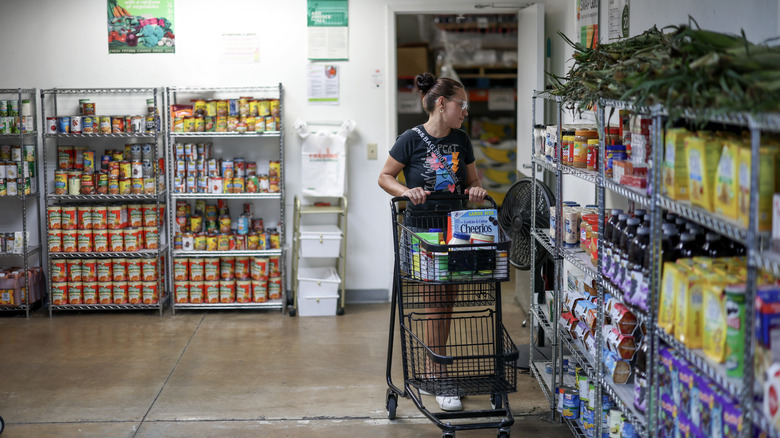person selecting items at food pantry