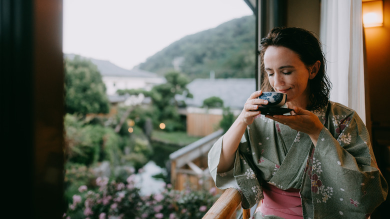 woman drinking green tea