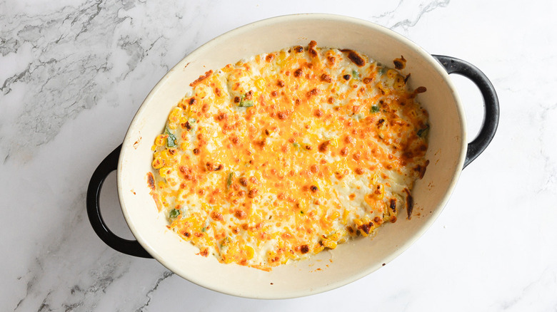 Broiled cheese on top of corn