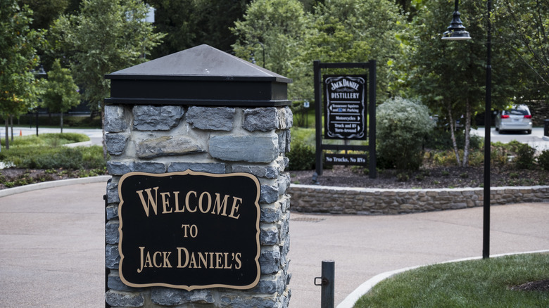 The main entrance sign welcoming visitors to the Jack Daniel's distillery in Lynchburg Tennessee