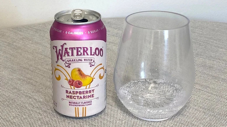 A can of Waterloo sparkling water beside a glass.
