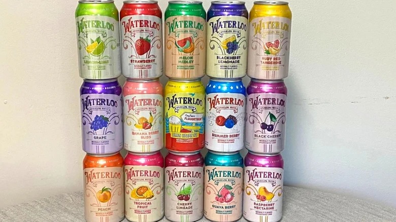Rows of Waterloo sparkling water flavors are stacked in rows.