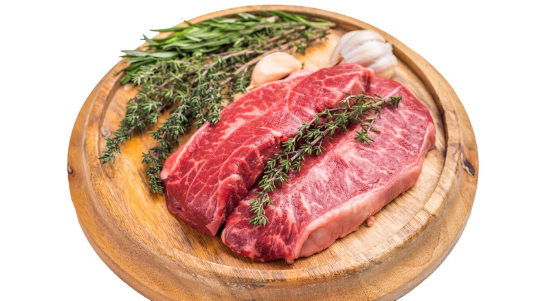 steak on a wooden board