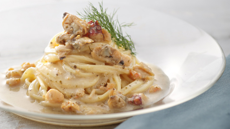 seafood pasta on white plate