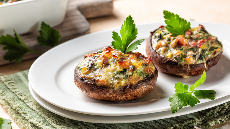 stuffed mushroom caps topped with herbs