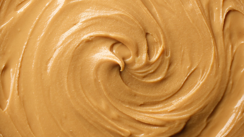 closeup of creamy peanut butter swirled in the center