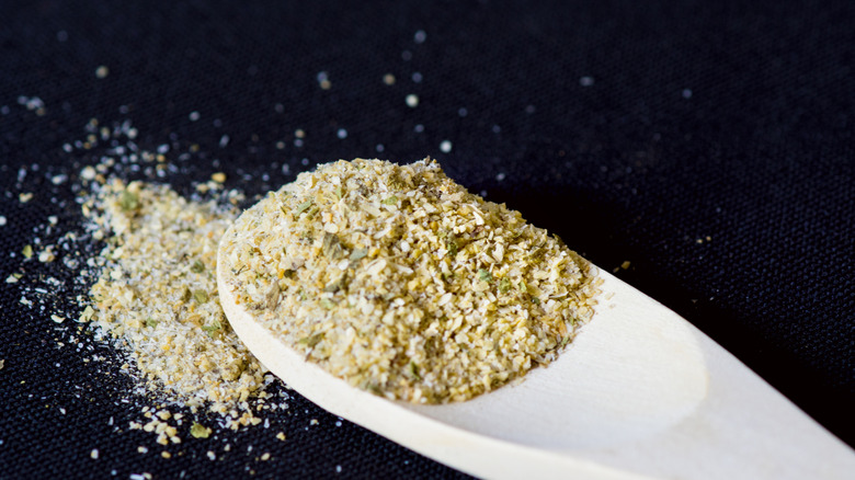 Seasoning on a spoon with black background