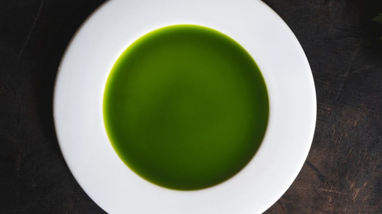 Parsley and herb oil on a table