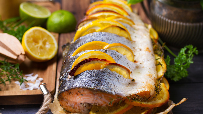 Whole salmon with lemon slices