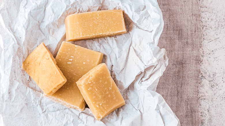 Parmesan rinds on crumbled white paper