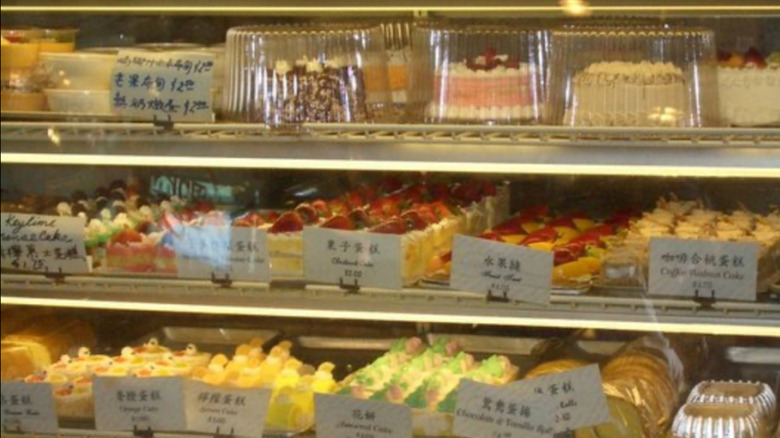 A pastry case filled with cakes and desserts