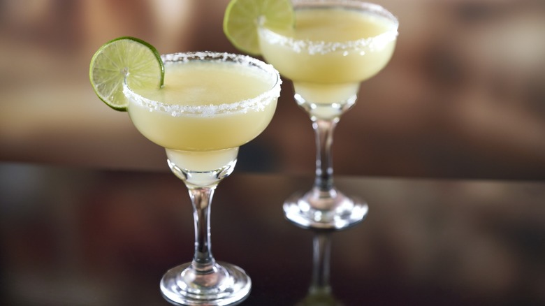 Two margaritas in coupe glasses