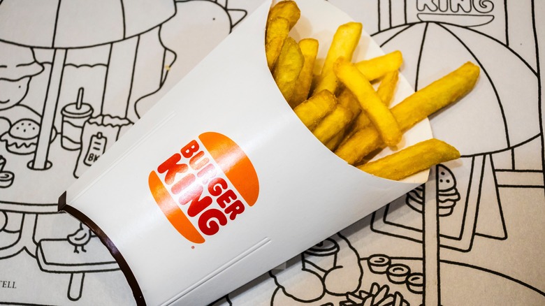 Serving of Burger King fries in cardboard container