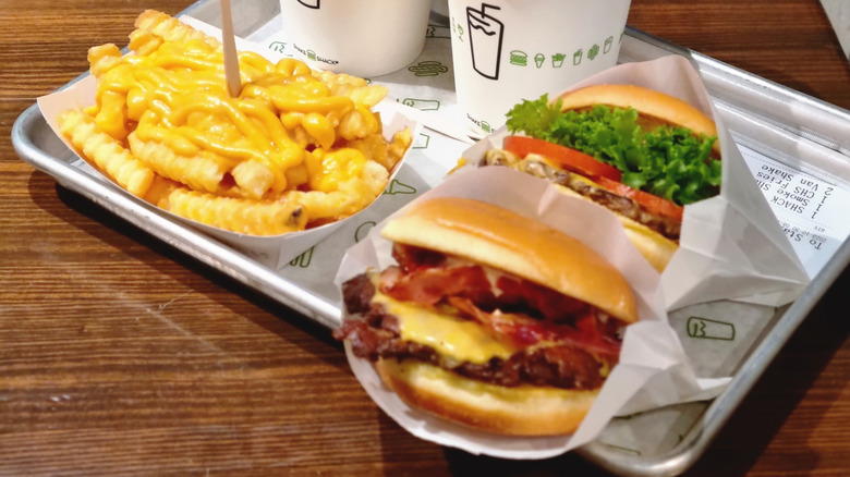 Shake shack burgers and cheese-topped fries