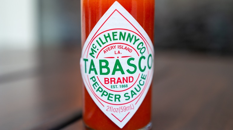 a close up photo of a bottle of Tabasco hot sauce