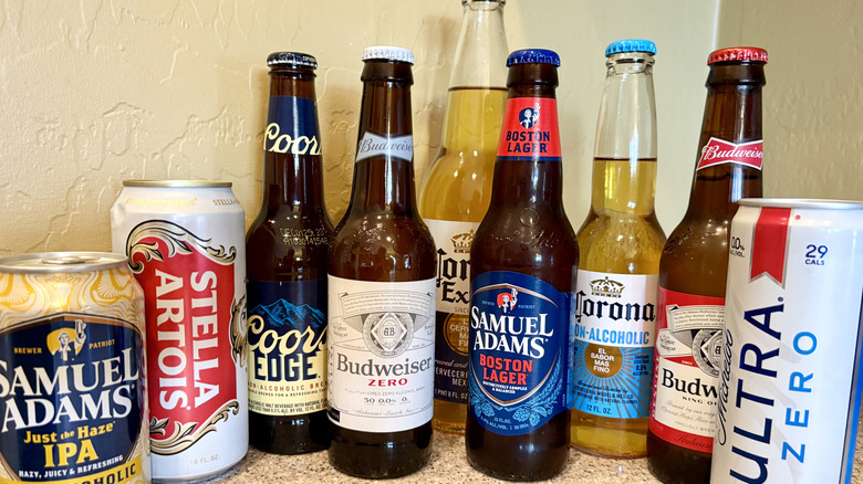Lineup of beers against a beige background