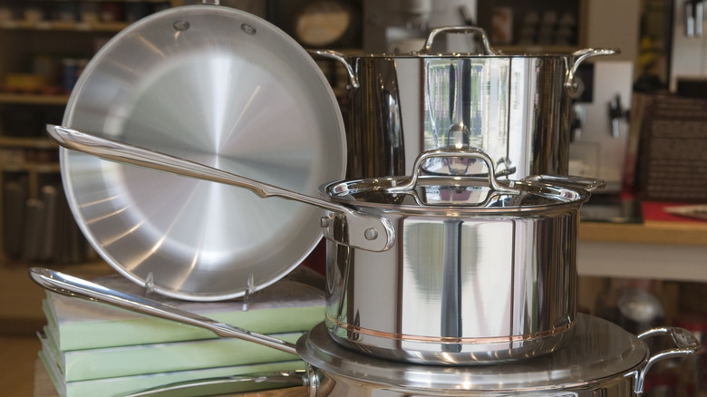 Pots and pans on display at a department store.