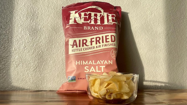 Bag and dish of Kettle Brand Air Fried Himalayan Salt Potato Chips