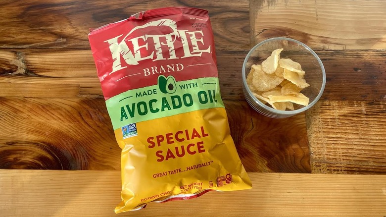 Over head view of a bag and dish of Kettle Brand Special Sauce Made With Avocado Oil Potato Chips