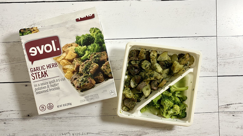 The box and tray of Evol Garlic Herb Steak