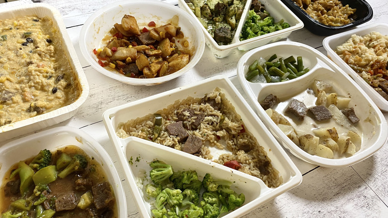 Assorted frozen steak dinners in two rows