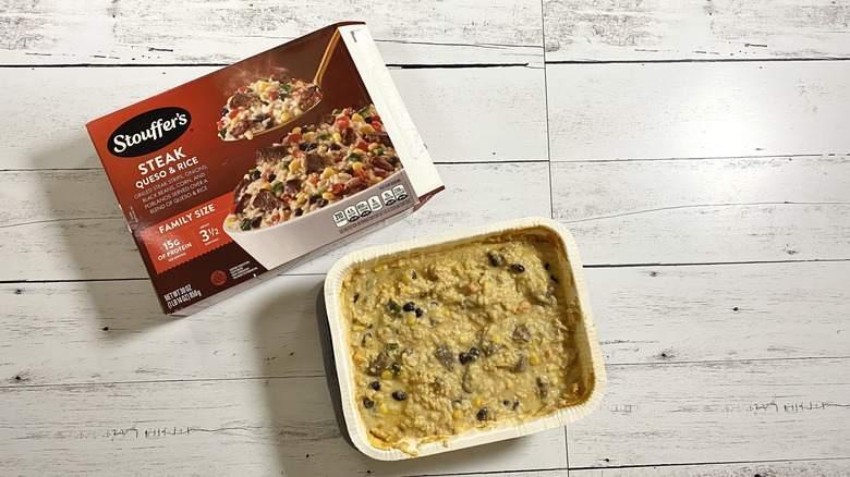 The box and tray of Stouffer's Steak Queso & Rice