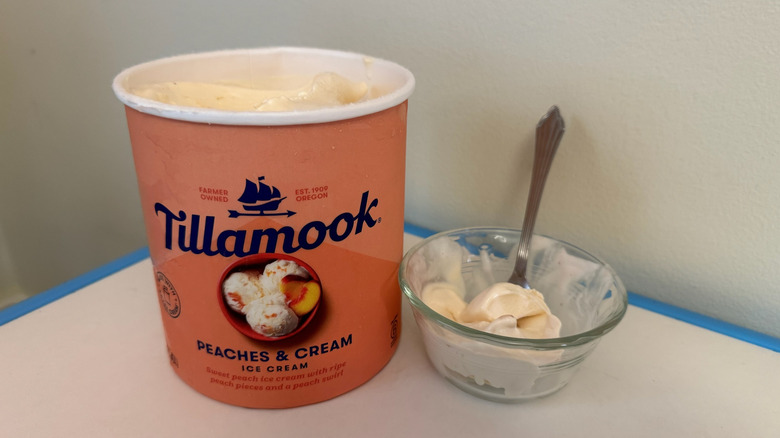 Tub and bowl of Tillamook Peaches & Cream Ice Cream