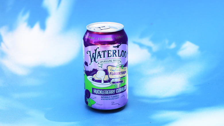 Single soda on blue backdrop