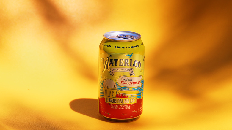 Can of soda on yellow background
