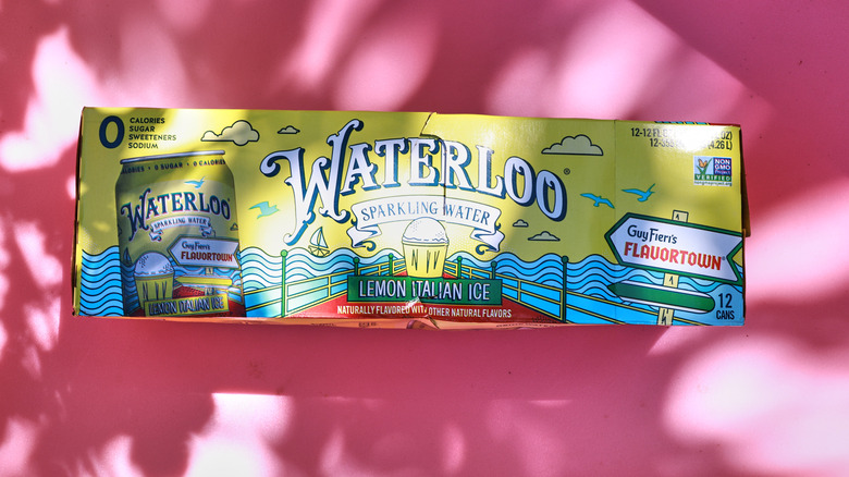 Case of Lemon Italian Ice soda on pink background
