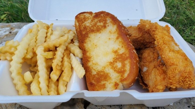 Raising Cane's chicken tenders, Texas toast, and crinkle cut fries