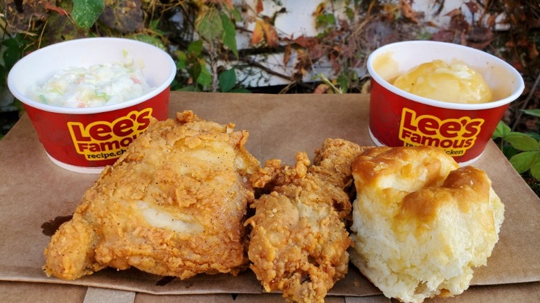 Lee's fried chicken with coleslaw, mashed potatoes, and gravy