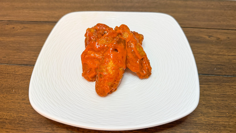 Classic buffalo wings on a white plate
