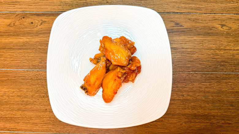 Sweet Asian Glazed wings on a white plate