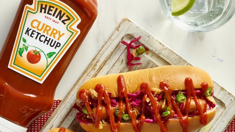 Bottle of Heinz curry ketchup and hotdogs