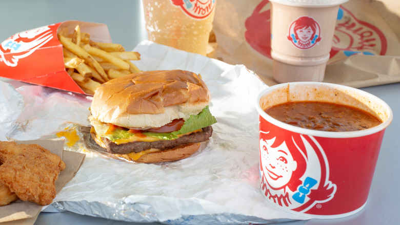 Wendy's chili along with other menu items on a table
