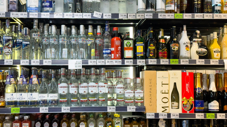 Various bottles of alcohol on a store shelf