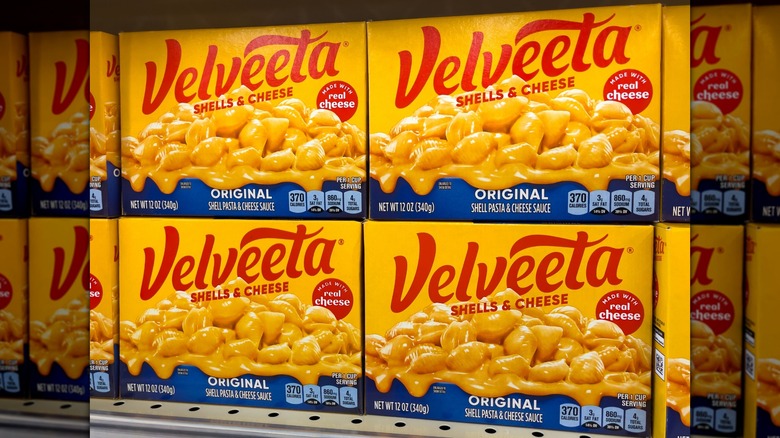 Boxes of Velveeta Shells & Cheese on store shelves